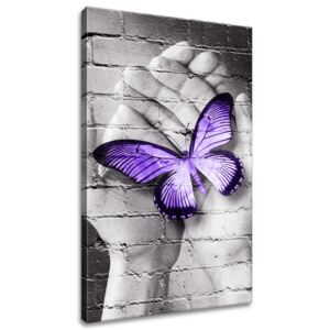 Gario Vászonkép Lila pillangó tenyéren Méretek (sz x m): 40 x 60 cm